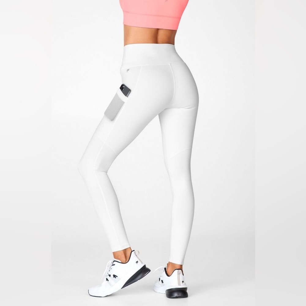 Whites of Fabletics leggings with pockets